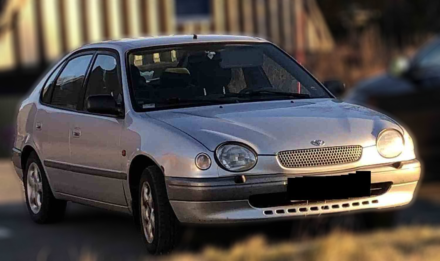 Toyota Corolla 4-dør hatchback,  generation E110 1.3 85 HK